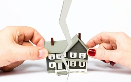 How is a mortgage loan divided in a divorce?
